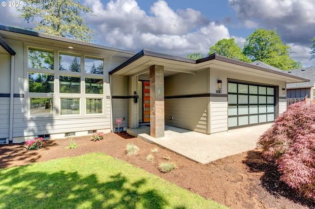 view of front of house featuring an attached garage