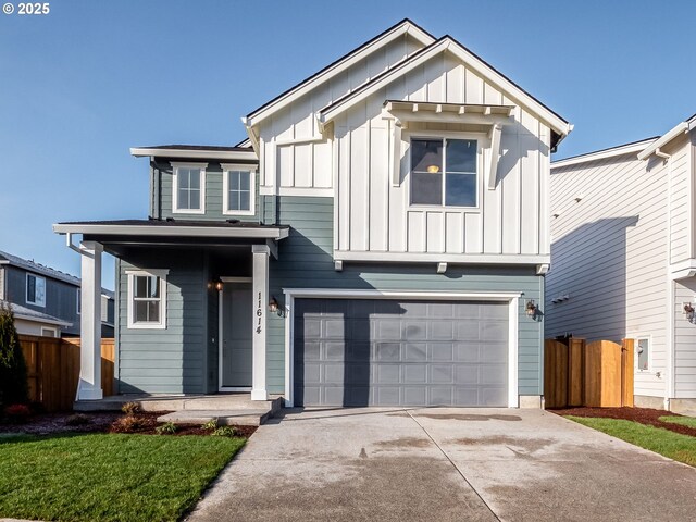 view of front facade with a garage and a front yard