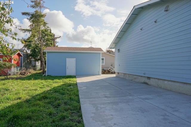 exterior space featuring a patio and a yard