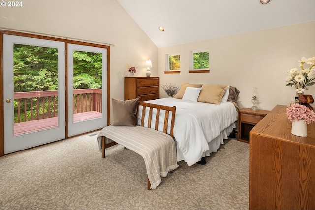 carpeted bedroom featuring access to outside, multiple windows, and lofted ceiling