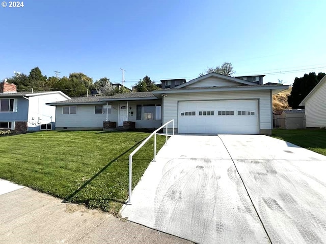 ranch-style home featuring driveway, an attached garage, a front lawn, and central AC