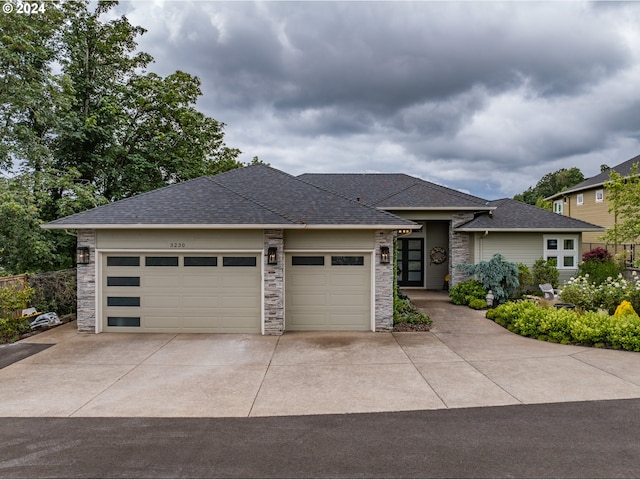 prairie-style house featuring a garage