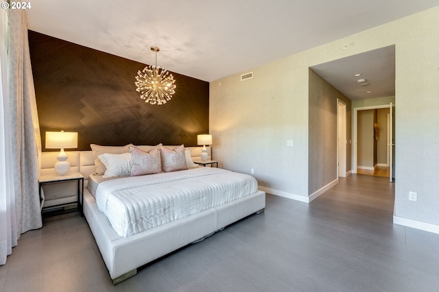 bedroom featuring a chandelier