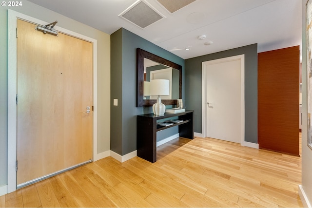 foyer entrance featuring light wood-type flooring