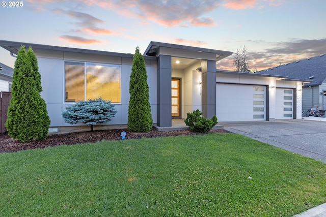 4012 SE 19th Ave, Brush Prairie, WA 98606 - contemporary home featuring an attached garage, concrete driveway, and a front lawn