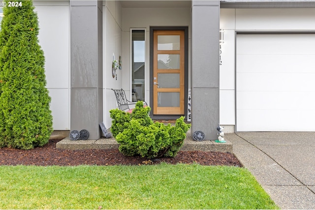 entrance to property with an attached garage