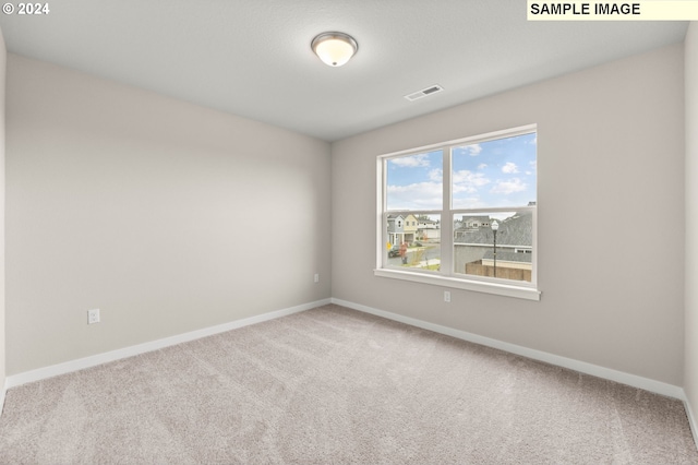 empty room with carpet floors