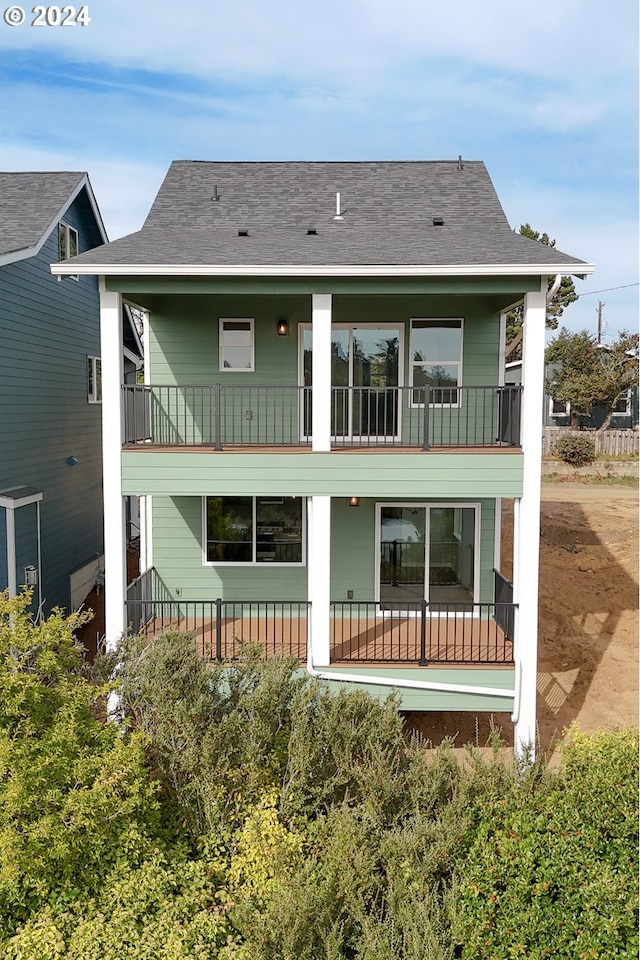rear view of house with a balcony