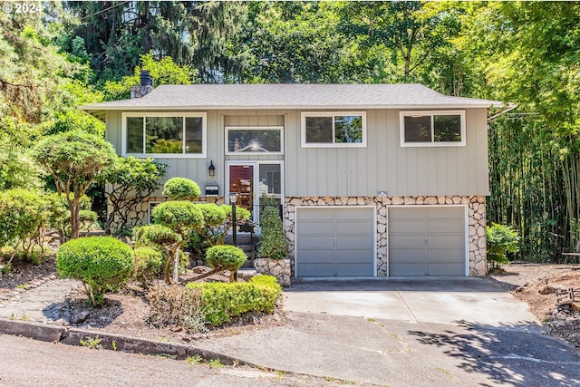 bi-level home featuring a garage