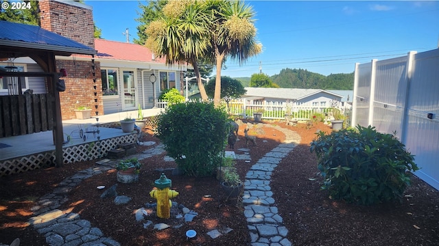 view of yard featuring a deck