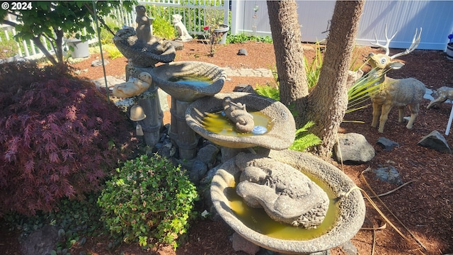 exterior details with a small pond