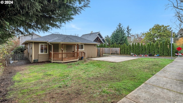 exterior space featuring a patio and a deck