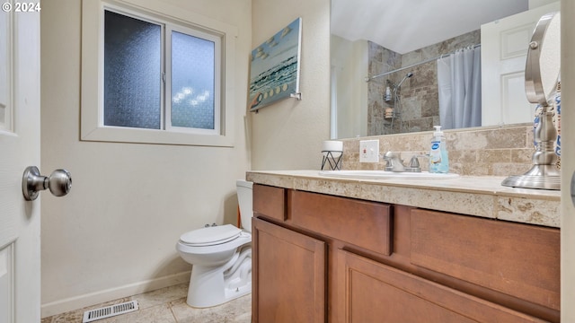 bathroom featuring vanity, tile patterned flooring, decorative backsplash, a shower with shower curtain, and toilet