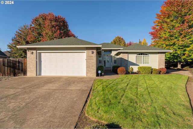 ranch-style house featuring concrete driveway, brick siding, an attached garage, and fence
