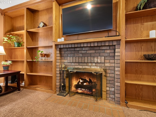 details featuring a brick fireplace and carpet flooring