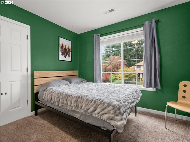 bedroom featuring carpet