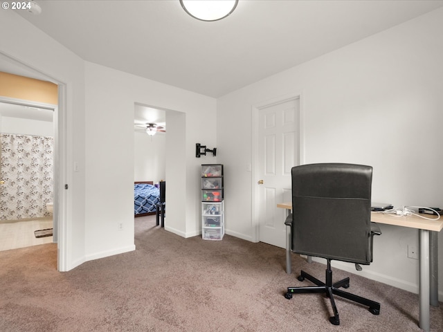 office with ceiling fan and carpet