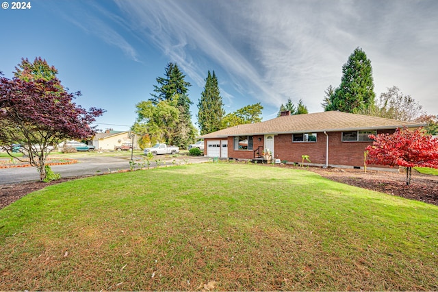 view of yard featuring a garage