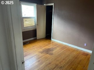 3214 W 10th St, The Dalles, OR 97058 - unfurnished room with light wood-type flooring and baseboards