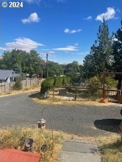 3214 W 10th St, The Dalles, OR 97058 - view of yard with a rural view and fence