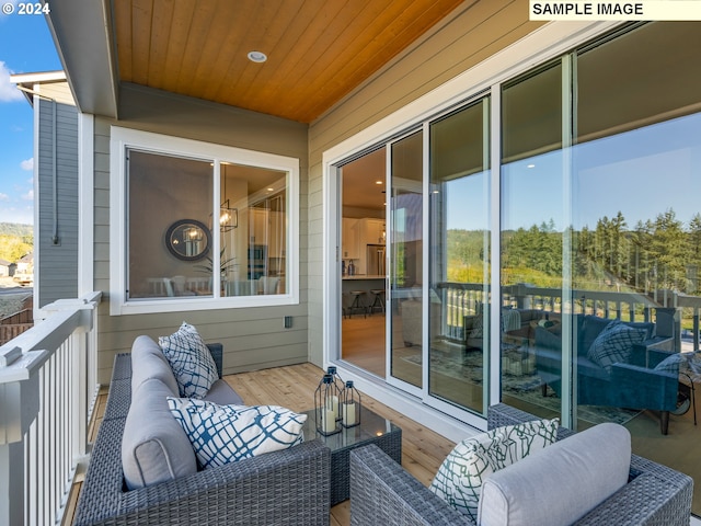 balcony with an outdoor hangout area