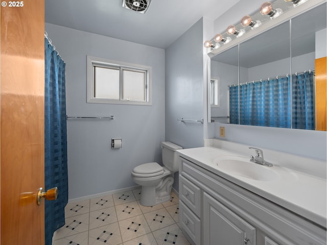 full bathroom with toilet, tile patterned floors, vanity, baseboards, and curtained shower