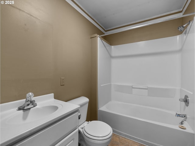 bathroom with tub / shower combination, toilet, crown molding, and vanity