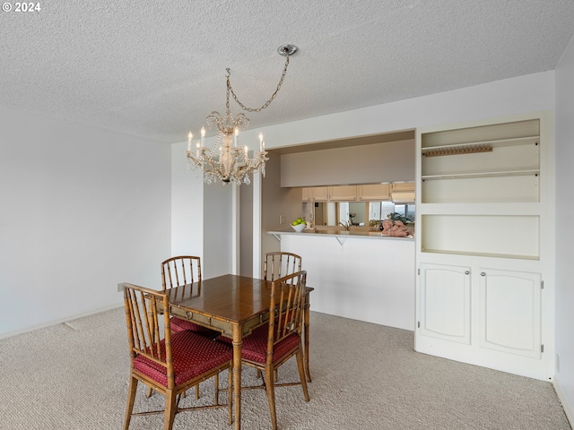 dining room featuring light carpet, a textured ceiling, and an inviting chandelier