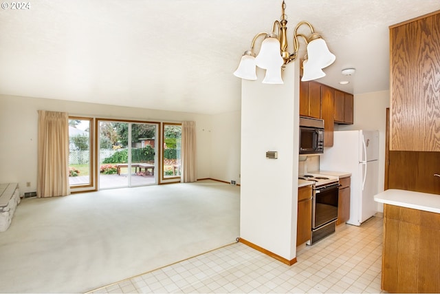 kitchen featuring light carpet, range with electric cooktop, pendant lighting, a notable chandelier, and white fridge