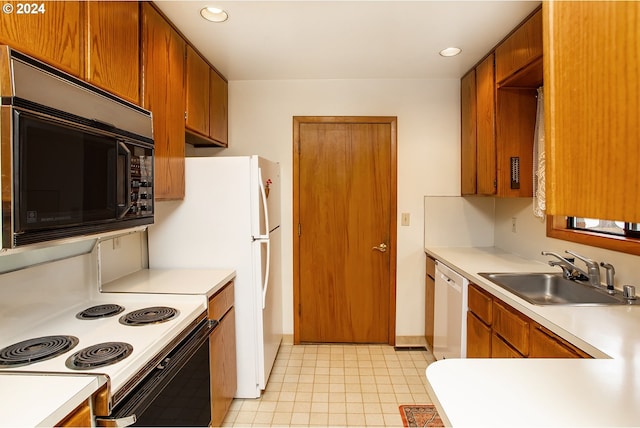 kitchen with white appliances and sink