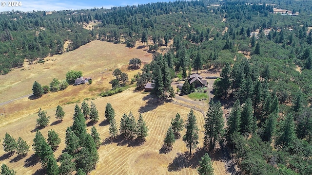 aerial view with a forest view and a rural view