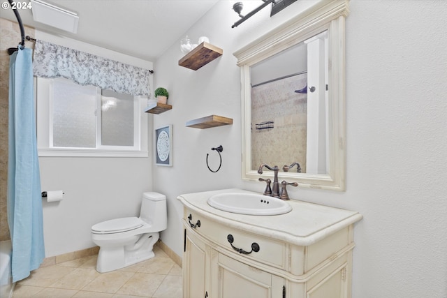 full bathroom with tile patterned floors, shower / bathtub combination with curtain, vanity, and toilet