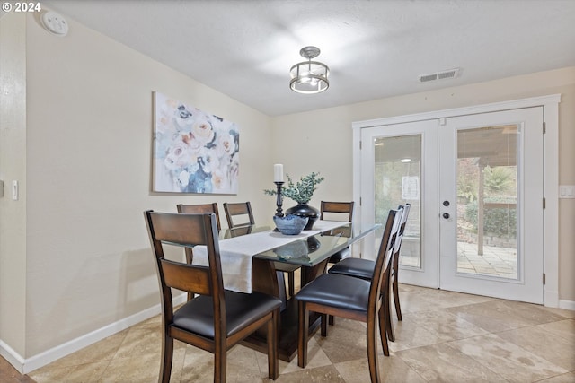 dining room featuring french doors