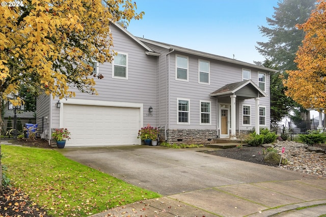 view of front of home featuring a garage