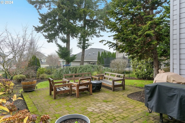 view of patio with a grill