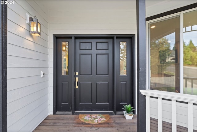 entrance to property with a porch