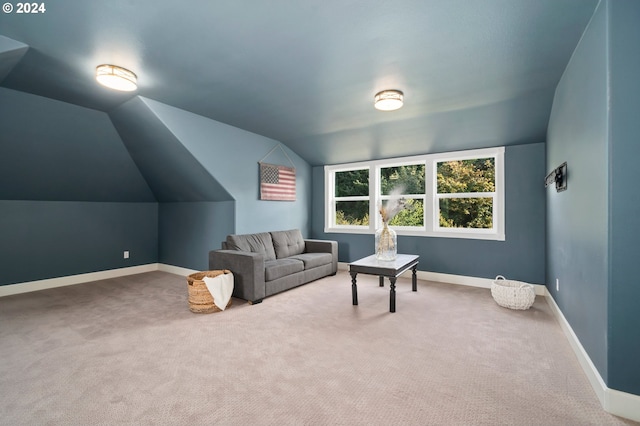 interior space with lofted ceiling and carpet floors