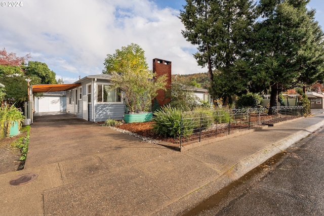 view of front of house with a carport