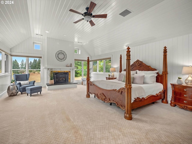 bedroom with light carpet, ceiling fan, and wood ceiling