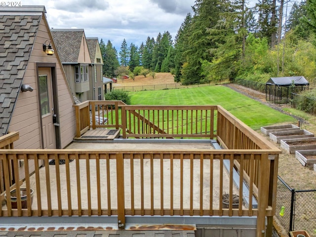 deck featuring a lawn