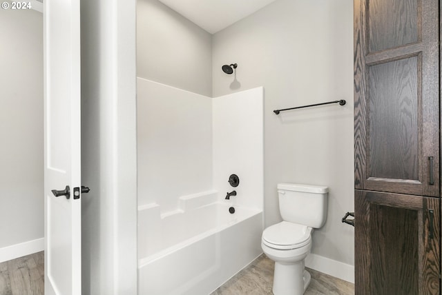 unfurnished bedroom featuring a closet and hardwood / wood-style flooring