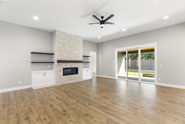 unfurnished bedroom with a closet, a textured ceiling, and light hardwood / wood-style floors