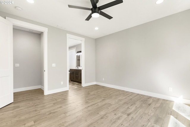 washroom with hookup for an electric dryer, cabinets, sink, and hookup for a washing machine