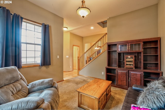 living room with light hardwood / wood-style flooring