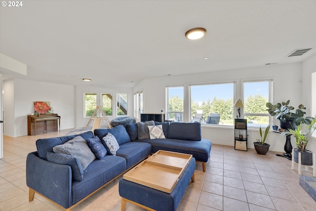 living room with light tile patterned floors