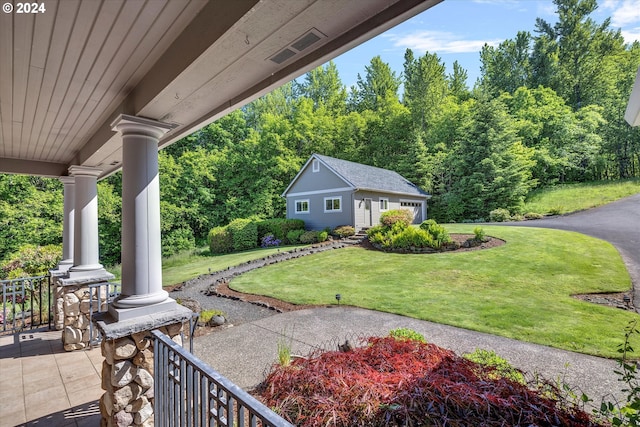 view of patio / terrace with an outdoor structure