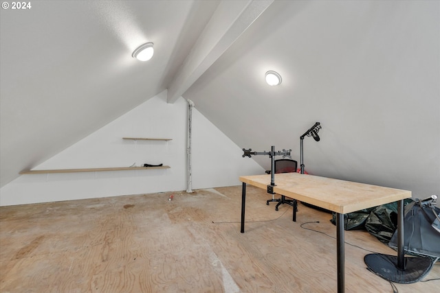 office area featuring lofted ceiling with beams