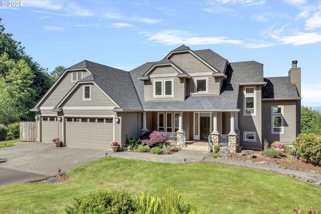 view of front facade featuring a front yard and a porch