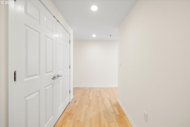 corridor featuring light hardwood / wood-style flooring