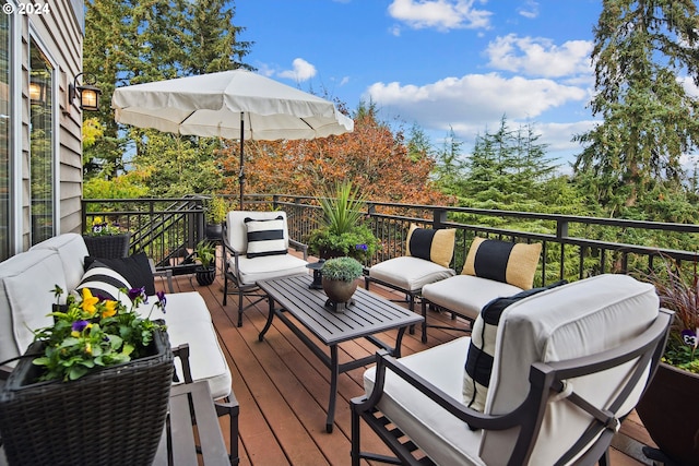 wooden deck featuring an outdoor living space